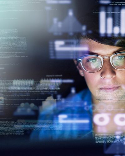 Cropped shot of a young computer programmer looking through data
