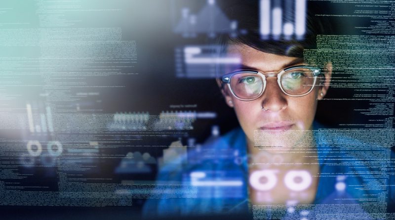 Cropped shot of a young computer programmer looking through data